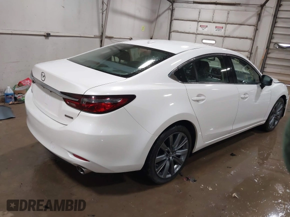 2019 Mazda 6 Grand Touring with VIN JM1GL1TYXK1505439, listed as a IAAI auction lot 41672678 with 52,990 mi miles and . Bid and sale history available at carsss.com. Image 4.