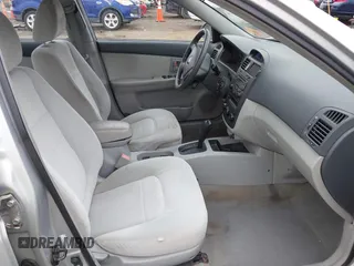 2006 Kia Spectra EX z VIN KNAFE121265360130, wystawiony jako IAAI lot #42345843 z przebiegiem 152 987 mil mil oraz . Historia ofert i sprzedaży dostępna na DreamBid. Obrazek 5.