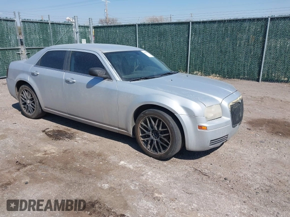 2007 Chrysler 300 with VIN 2C3KA43R67H664434, listed as a IAAI auction lot 41884172 with 238,451 mi miles. Bid and sale history available at carsss.com. Image 1.