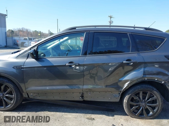 2017 Ford Escape SE with VIN 1FMCU9GD9HUC84906, listed as a IAAI auction lot 41762989 with 147,721 mi miles. Bid and sale history available at carsss.com. Image 14.