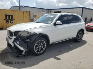 2015 BMW X5 xDrive35i with VIN 5UXKR0C52F0P07288, listed as a Copart auction lot 51697585 with 111,896 mi miles and Salvage Title. Bid and sale history available at carsss.com. Image 1.