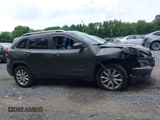 2014 Jeep Cherokee Limited with VIN 1C4PJMDB2EW216225, listed as a IAAI auction lot 42672551 with 151,799 mi miles and . Bid and sale history available at DreamBid. Image 13.