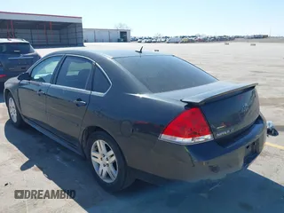 2013 Chevrolet Impala LT with VIN 2G1WB5E31D1163179, listed as a IAAI auction lot 41908130 with 190,801 mi miles and . Bid and sale history available at DreamBid. Image 3.