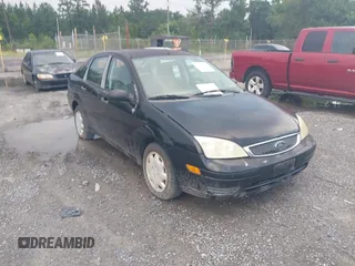 2007 Ford Focus S with VIN 1FAHP34N77W281443, listed as a IAAI auction lot 42693290 with 164,336 mi miles and . Bid and sale history available at DreamBid. Image 1.