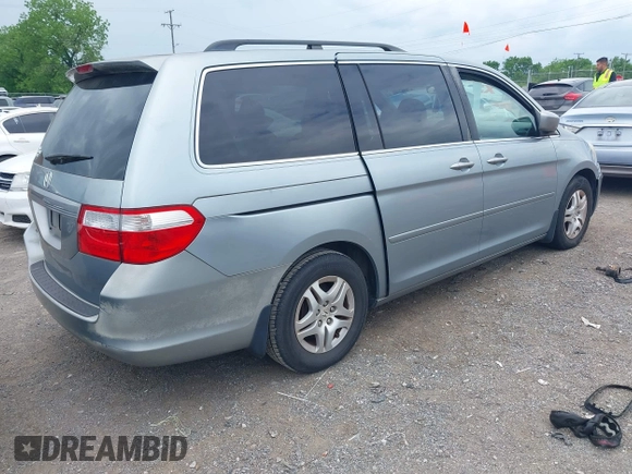 2007 Honda Odyssey EX-L with VIN 5FNRL38627B055862, listed as a IAAI auction lot 42148442 with 225,627 mi miles. Bid and sale history available at carsss.com. Image 4.