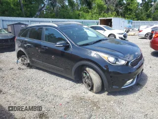 2017 Kia Niro EX with VIN KNDCC3LC0H5065876, listed as a Copart auction lot 51211655 with 104,486 mi miles and Non Repairable. Bid and sale history available at carsss.com. Image 4.