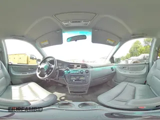 2003 Honda Odyssey EX-L с VIN 2HKRL18033H501741, выставлен на аукционе Copart как лот 60496865 с пробегом Не указан миль и Списание • Salvage title. История ставок и продаж доступна на DreamBid. Изображение 16.