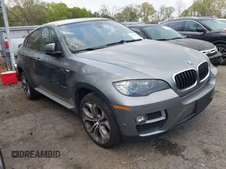 2014 BMW X6 xDrive35i z VIN 5UXFG2C56E0C44026, wystawiony jako IAAI lot #41845155 z przebiegiem 122 591 mil mil oraz . Historia ofert i sprzedaży dostępna na DreamBid. Obrazek 1.