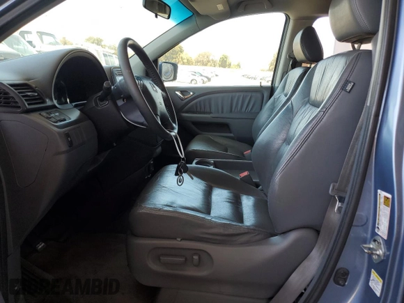 2007 Honda Odyssey EX-L z VIN 5FNRL38647B077250, wystawiony jako Copart lot #56925425 z przebiegiem 159 281 mil mil oraz Szkoda całkowita • Salvage title. Historia ofert i sprzedaży dostępna na DreamBid. Obrazek 7.