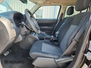 2015 Jeep Patriot Sport with VIN 1C4NJRBB6FD412494, listed as a Copart auction lot 60034025 with 51,621 mi miles and Salvage title. Bid and sale history available at DreamBid. Image 7.