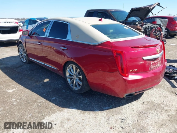 2014 Cadillac XTS Luxury with VIN 2G61M5S35E9297781, listed as a IAAI auction lot 41765330 with 149,770 mi miles and . Bid and sale history available at DreamBid. Image 3.