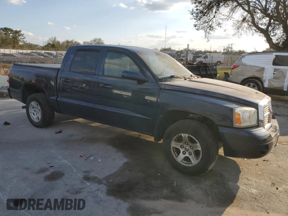 2007 Dodge Dakota SLT with VIN 1D7HE48K97S181024, listed as a Copart auction lot 44244355 with 110,016 mi miles and Salvage Title. Bid and sale history available at DreamBid. Image 4.