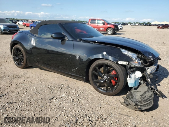 2014 Nissan 370Z Touring with VIN JN1AZ4FH3EM621279, listed as a Copart auction lot 52284814 with 60,479 mi miles and Salvage Title. Bid and sale history available at DreamBid. Image 4.