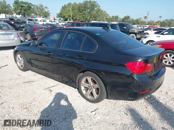 2013 BMW 3 Series 328i with VIN WBA3A5C53DF351970, listed as a IAAI auction lot 42142508 with 174,265 mi miles. Bid and sale history available at carsss.com. Image 3.