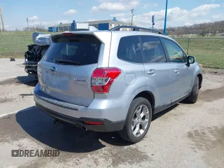2016 Subaru Forester 2.5i Touring with VIN JF2SJAVC8GH493549, listed as a IAAI auction lot 41875775 with 74,767 mi miles. Bid and sale history available at carsss.com. Image 4.