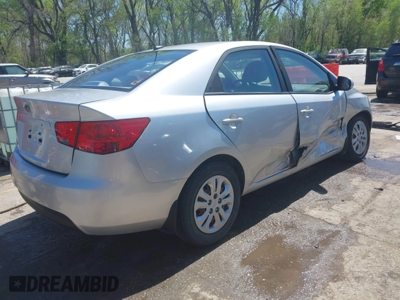 2010 Kia Forte LX with VIN KNAFT4A29A5061695, listed as a IAAI auction lot 42034559 with 114,470 mi miles. Bid and sale history available at carsss.com. Image 4.