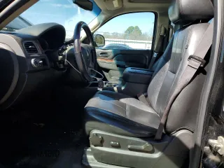 2014 Chevrolet Suburban LT with VIN 1GNSCJE01ER117627, listed as a Copart auction lot 46075985 with 258,564 mi miles and Salvage Title. Bid and sale history available at carsss.com. Image 7.