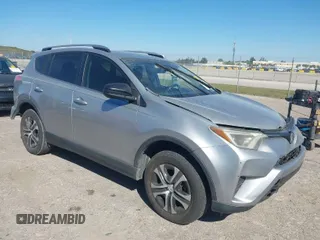 2018 Toyota RAV4 LE with VIN JTMZFREVXJJ196183, listed as a IAAI auction lot 41776107 with 82,713 mi miles. Bid and sale history available at carsss.com. Image 1.