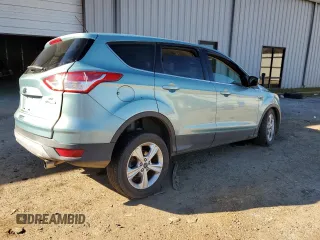 2013 Ford Escape SE with VIN 1FMCU0GXXDUB36747, listed as a Copart auction lot 84262084 with 105,246 mi miles and Salvage Title. Bid and sale history available at carsss.com. Image 3.