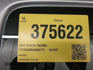 2018 Toyota Tacoma SR with VIN 5TFSX5EN6JX062775, listed as a IAAI auction lot 42774090 with 146,583 mi miles and . Bid and sale history available at DreamBid. Image 34.