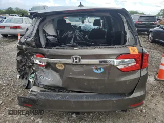 2019 Honda Odyssey EX-L z VIN 5FNRL6H79KB133976, wystawiony jako Copart lot #56988215 z przebiegiem Nie podano mil oraz Szkoda całkowita • Salvage title. Historia ofert i sprzedaży dostępna na DreamBid. Obrazek 6.