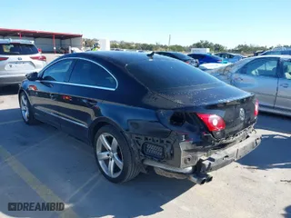 2011 Volkswagen CC Lux with VIN WVWHN7AN0BE718029, listed as a IAAI auction lot 41164485 with 140,461 mi miles. Bid and sale history available at carsss.com. Image 3.