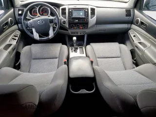 2014 Toyota Tacoma with VIN 3TMLU4EN4EM140862, listed as a Copart auction lot 55147955 with 128,615 mi miles and Clean Title. Bid and sale history available at DreamBid. Image 8.