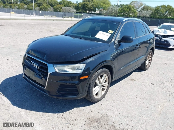 2017 Audi Q3 Premium with VIN WA1BCCFS6HR002749, listed as a IAAI auction lot 41776420 with 90,664 mi miles. Bid and sale history available at carsss.com. Image 18.