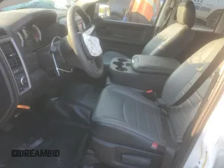 2023 Ram 1500 Express with VIN 1C6RR6FT8PS516520, listed as a Copart auction lot 69469573 with 5,159 mi miles and Salvage title. Bid and sale history available at DreamBid. Image 7.