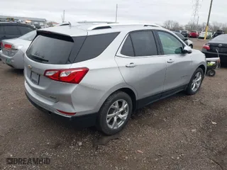 2018 Chevrolet Equinox Premier with VIN 3GNAXPEU2JS559250, listed as a IAAI auction lot 41927520 with 123,445 mi miles. Bid and sale history available at carsss.com. Image 4.