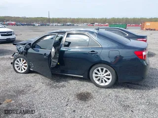 2013 Toyota Camry Hybrid LE with VIN 4T1BD1FK5DU076612, listed as a IAAI auction lot 42000025 with 210,000 mi miles. Bid and sale history available at carsss.com. Image 14.
