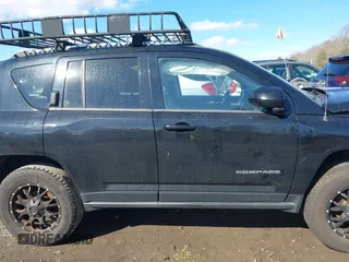 2014 Jeep Compass Latitude with VIN 1C4NJDEB2ED626380, listed as a IAAI auction lot 41675908 with 90,153 mi miles. Bid and sale history available at carsss.com. Image 14.
