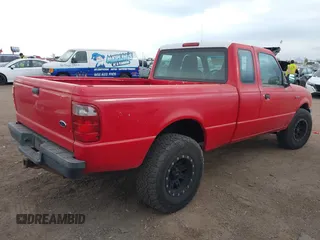 2005 Ford Ranger XL with VIN 1FTYR15E95PA58593, listed as a IAAI auction lot 41706058 with 129,282 mi miles. Bid and sale history available at carsss.com. Image 4.