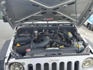 2008 Jeep Wrangler X z VIN 1J4FA24168L549082, wystawiony jako Copart lot #58178805 z przebiegiem 150 606 mil mil oraz Szkoda całkowita • Salvage title. Historia ofert i sprzedaży dostępna na DreamBid. Obrazek 12.