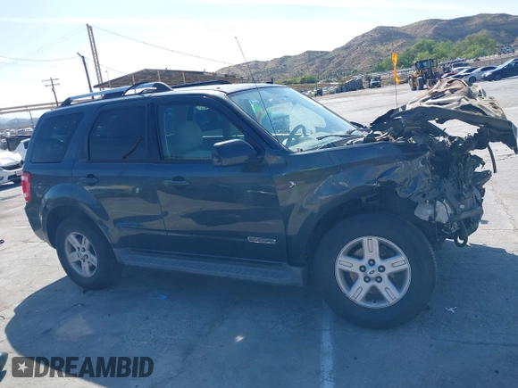 2008 Ford Escape Hybrid with VIN 1FMCU49H58KE79125, listed as a IAAI auction lot 42157559 with 197,964 mi miles and . Bid and sale history available at DreamBid. Image 14.
