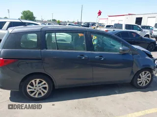 2012 Mazda 5 Sport with VIN JM1CW2BL1C0116150, listed as a IAAI auction lot 42571812 with 124,236 mi miles and . Bid and sale history available at DreamBid. Image 14.