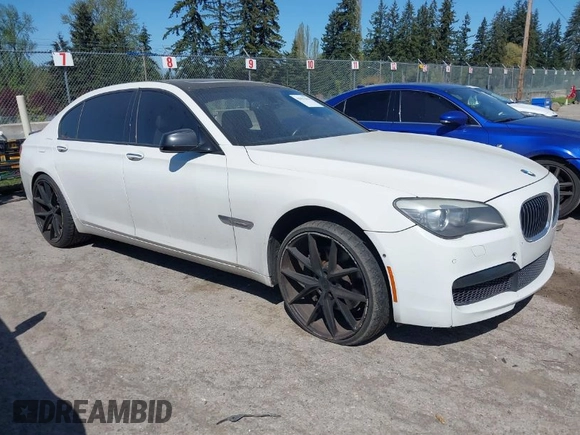 2012 BMW 7 Series 750Li with VIN WBAKB8C52CDX20757, listed as a IAAI auction lot 42057654 with 137,947 mi miles. Bid and sale history available at carsss.com. Image 1.