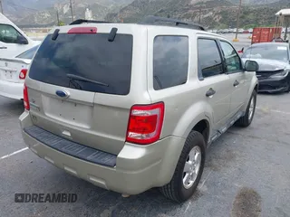 2012 Ford Escape XLT with VIN 1FMCU0D74CKA07739, listed as a IAAI auction lot 42100820 with 308,265 mi miles. Bid and sale history available at carsss.com. Image 4.