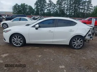 2014 Mazda 3 S Touring with VIN JM1BM1V31E1208377, listed as a IAAI auction lot 42388524 with 122,124 mi miles and . Bid and sale history available at DreamBid. Image 15.