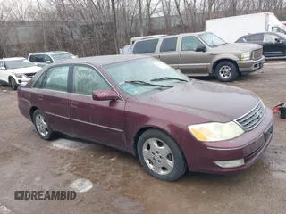2003 Toyota Avalon XL z VIN 4T1BF28B73U277665, wystawiony jako IAAI lot #38448605 z przebiegiem 265 359 mil mil oraz . Historia ofert i sprzedaży dostępna na DreamBid. Obrazek 1.