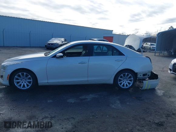 2014 Cadillac CTS Sedan RWD with VIN 1G6AP5SX2E0128760, listed as a IAAI auction lot 41719528 with 101,916 mi miles. Bid and sale history available at carsss.com. Image 15.