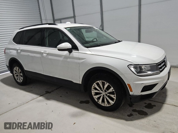 2018 Volkswagen Tiguan S with VIN 3VV0B7AX0JM084884, listed as a Copart auction lot 59162025 with 106,399 mi miles and Clean title. Bid and sale history available at DreamBid. Image 4.