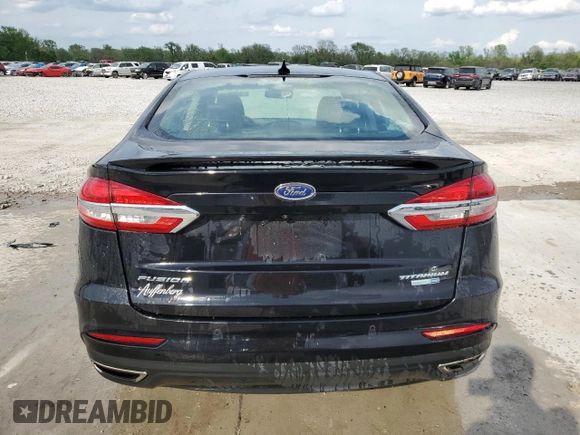 2020 Ford Fusion Titanium with VIN 3FA6P0D90LR192500, listed as a Copart auction lot 53746345 with 135,636 mi miles and Salvage title. Bid and sale history available at DreamBid. Image 6.