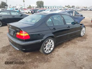 2005 BMW 3 Series 330i with VIN WBAEV53415KM08390, listed as a IAAI auction lot 41507259 with 192,211 mi miles. Bid and sale history available at carsss.com. Image 4.