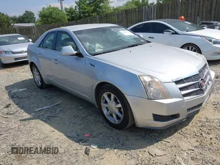 2009 Cadillac CTS AWD with VIN 1G6DG577990142389, listed as a IAAI auction lot 42823931 with 127,627 mi miles and . Bid and sale history available at DreamBid. Image 1.
