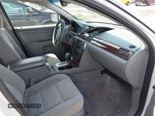 2007 Ford Five Hundred SEL z VIN 1FAHP24107G144667, wystawiony jako IAAI lot #41606069 z przebiegiem Nie podano mil oraz . Historia ofert i sprzedaży dostępna na DreamBid. Obrazek 5.