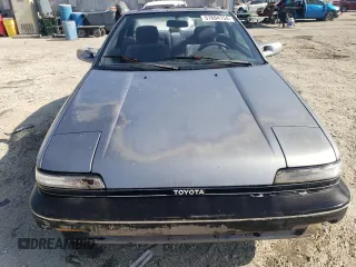 1990 Toyota Corolla z VIN JT2AE96J0L3382052, wystawiony jako Copart lot #57894754 z przebiegiem 90 550 mil mil oraz Czysty tytuł • Clean title. Historia ofert i sprzedaży dostępna na DreamBid. Obrazek 5.