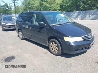 2003 Honda Odyssey EX-L with VIN 5FNRL18003B042487, listed as a IAAI auction lot 42604399 with 188,126 mi miles and . Bid and sale history available at DreamBid. Image 1.