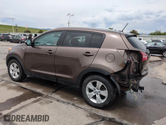 2013 Kia Sportage LX z VIN KNDPBCA29D7458904, wystawiony jako Copart lot #59175745 z przebiegiem 100 719 mil mil oraz Szkoda całkowita • Salvage title. Historia ofert i sprzedaży dostępna na DreamBid. Obrazek 2.