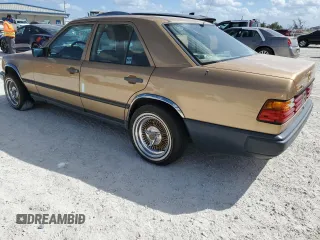 1986 Mercedes-Benz 300 300E with VIN WDBEA30D5GA296062, listed as a Copart auction lot 77434624 with 112,899 mi miles and Salvage Title. Bid and sale history available at carsss.com. Image 2.